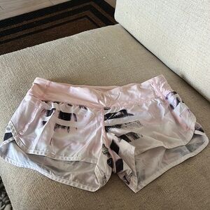 Lillie on Speed Up short in pink and white pattern, size 8